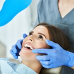 Patient reviewing smile results during cosmetic dental consultation in Houston